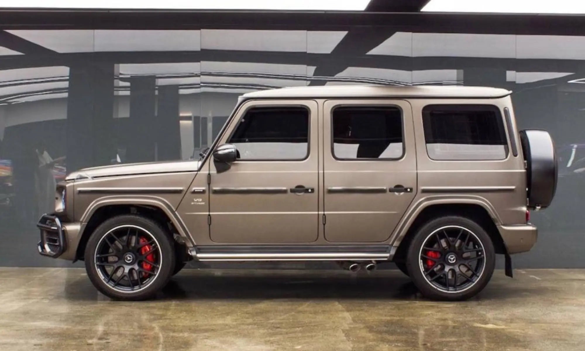 Rent Mercedes-Benz G63 2023 Matte Champagne or similar DRD Car Rental LLC