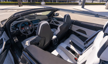 Rent BMW M4 Competition Convertible 2023 Black or similar DRD Car Rental LLC