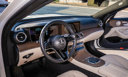 Rent Mercedes-Benz E350 AMG 2023 White or similar DRD Car Rental LLC