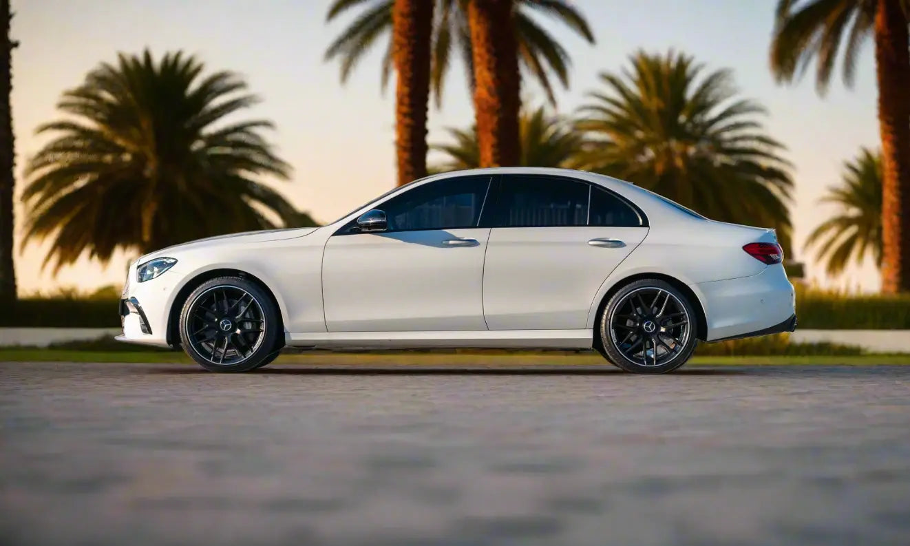 Rent Mercedes-Benz E350 AMG 2023 White or similar DRD Car Rental LLC