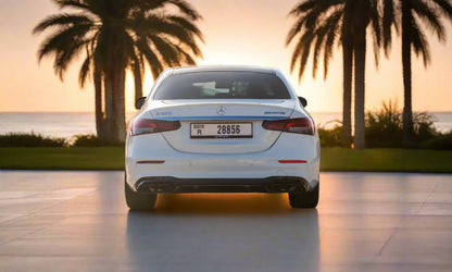 Rent Mercedes-Benz E350 AMG 2023 White or similar DRD Car Rental LLC